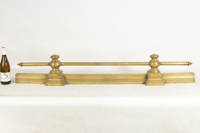 Lot 441 - A 19TH CENTURY BRASS FENDER