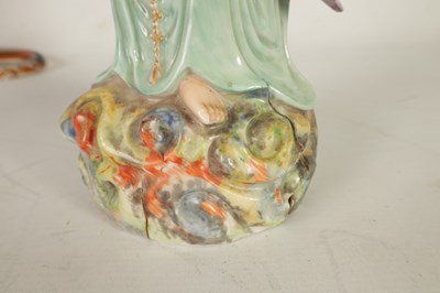 Lot 215 - A 19TH CENTURY CHINESE PORCELAIN GUAN YIN STATUE