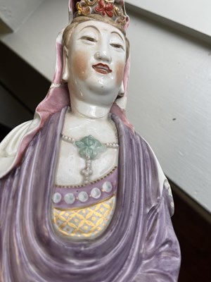 Lot 215 - A 19TH CENTURY CHINESE PORCELAIN GUAN YIN STATUE