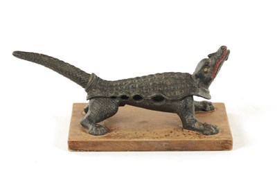 Lot 627 - A LATE 19TH CENTURY CAST IRON APOTHECARY CHEMISTS CORK PRESS FORMED AS A CROCODILE