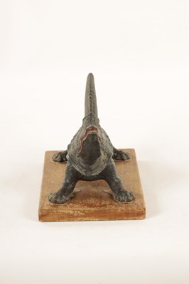 Lot 627 - A LATE 19TH CENTURY CAST IRON APOTHECARY CHEMISTS CORK PRESS FORMED AS A CROCODILE