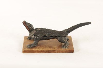 Lot 627 - A LATE 19TH CENTURY CAST IRON APOTHECARY CHEMISTS CORK PRESS FORMED AS A CROCODILE