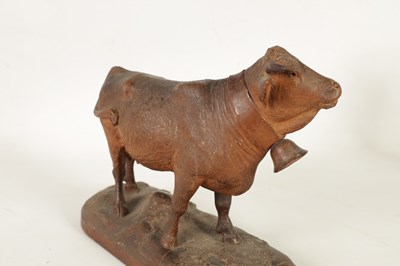 Lot 857 - A 19TH CENTURY SWISS CARVED LINDEN WOOD COW IN THE MANNER OF JOHANN HUGGLER