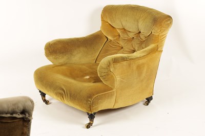 Lot 1186 - TWO LATE 19TH CENTURY HOWARD STYLE BUTTON UPHOLSTERED LOW SEATED ARMCHAIRS