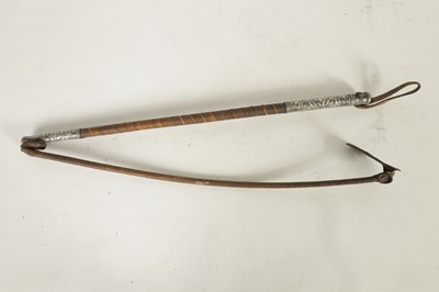 Lot 450 - AN EARLY 19TH CENTURY CAUCASIAN  SILVER NIELLO AND LEATHER-BOUND FOLDING RIDING CROP
