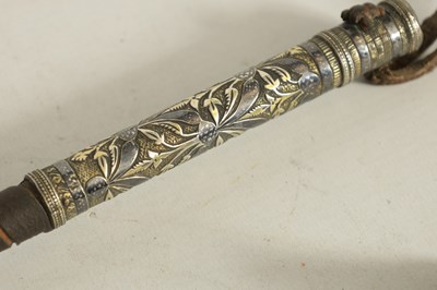 Lot 450 - AN EARLY 19TH CENTURY CAUCASIAN  SILVER NIELLO AND LEATHER-BOUND FOLDING RIDING CROP