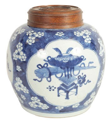 Lot 177 - AN EARLY CHINESE BLUE AND WHITE GINGER JAR WITH LATER HARDWOOD COVER