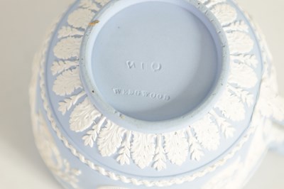 Lot 58 - A LATE 18TH CENTURY WEDGWOOD JASPERWARE CUP AND SAUCER