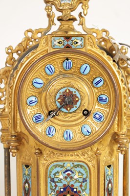 Lot 791 - A LATE 19TH CENTURY FRENCH GILT METAL AND CHAMPLEVE ENAMEL CLOCK GARNITURE