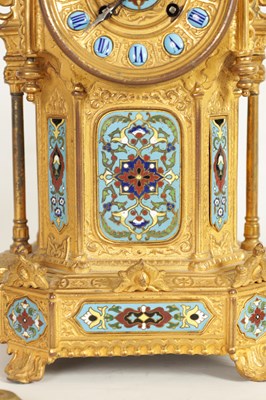 Lot 791 - A LATE 19TH CENTURY FRENCH GILT METAL AND CHAMPLEVE ENAMEL CLOCK GARNITURE