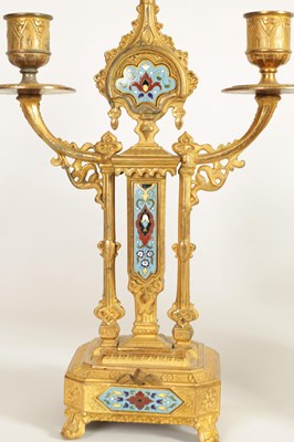 Lot 791 - A LATE 19TH CENTURY FRENCH GILT METAL AND CHAMPLEVE ENAMEL CLOCK GARNITURE