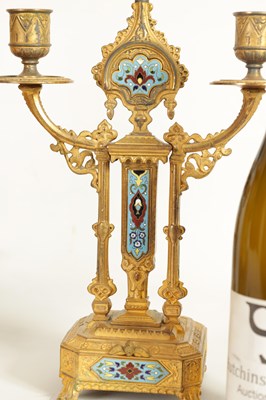 Lot 791 - A LATE 19TH CENTURY FRENCH GILT METAL AND CHAMPLEVE ENAMEL CLOCK GARNITURE