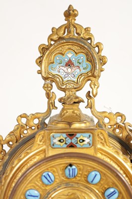 Lot 791 - A LATE 19TH CENTURY FRENCH GILT METAL AND CHAMPLEVE ENAMEL CLOCK GARNITURE
