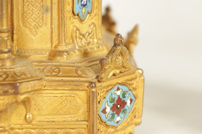 Lot 791 - A LATE 19TH CENTURY FRENCH GILT METAL AND CHAMPLEVE ENAMEL CLOCK GARNITURE