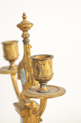 Lot 791 - A LATE 19TH CENTURY FRENCH GILT METAL AND CHAMPLEVE ENAMEL CLOCK GARNITURE