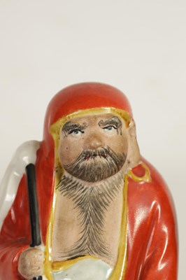 Lot 155 - TWO MEIJI PERIOD JAPANESE KUTANI PORCELAIN FIGURES OF DARUMA