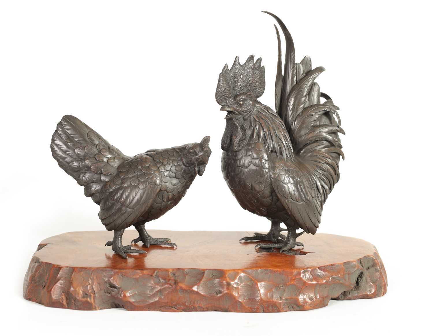 Lot 209 - A JAPANESE MEIJI PATINATED BRONZE SCULPTURE ON HARDWOOD BASE