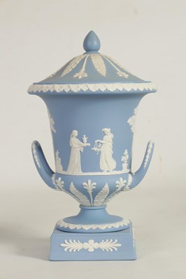 Lot 78 - A WEDGWOOD JASPERWARE CAMPANA SHAPED VASE AND COVER