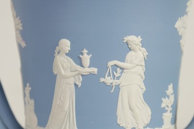 Lot 78 - A WEDGWOOD JASPERWARE CAMPANA SHAPED VASE AND COVER