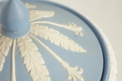 Lot 78 - A WEDGWOOD JASPERWARE CAMPANA SHAPED VASE AND COVER