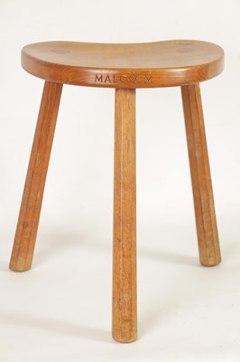 Lot 856 - A ROBERT ‘MOUSEMAN’ THOMPSON LIGHTLY ADZED OAK MILKING STOOL