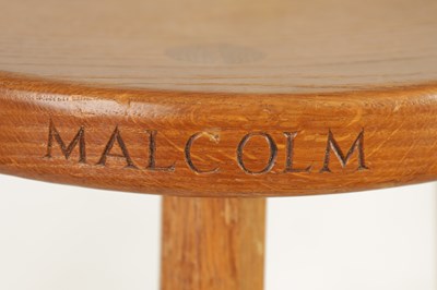 Lot 856 - A ROBERT ‘MOUSEMAN’ THOMPSON LIGHTLY ADZED OAK MILKING STOOL