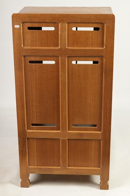 Lot 847 - AN UNUSUAL ROBERT ‘MOUSEMAN’ THOMPSON JOINED ADZED LIGHT OAK  MUSIC CABINET/CENTRE