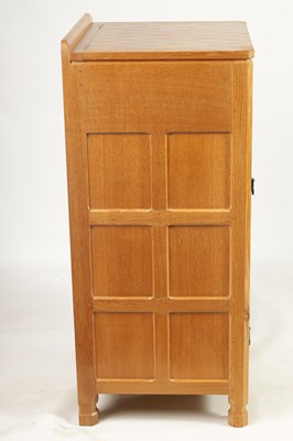 Lot 847 - AN UNUSUAL ROBERT ‘MOUSEMAN’ THOMPSON JOINED ADZED LIGHT OAK  MUSIC CABINET/CENTRE