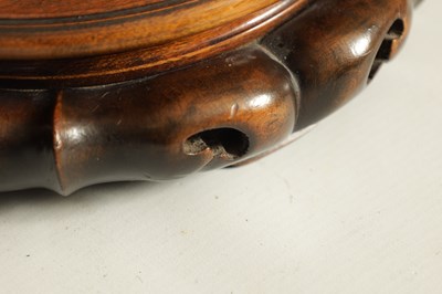 Lot 131 - A COLLECTION OF THREE CHINESE HARDWOOD VASE STANDS