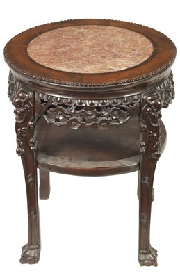 Lot 244 - A 19TH CENTURY PROFUSELY CARVED CHINESE HARDWOOD CIRCULAR JARDINIERE STAND