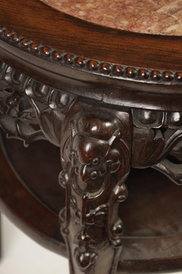 Lot 244 - A 19TH CENTURY PROFUSELY CARVED CHINESE HARDWOOD CIRCULAR JARDINIERE STAND