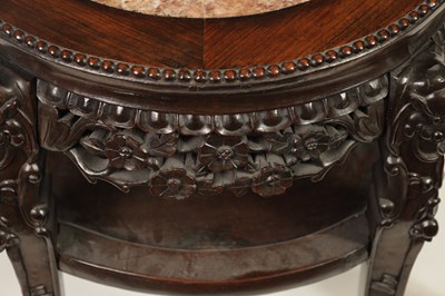 Lot 244 - A 19TH CENTURY PROFUSELY CARVED CHINESE HARDWOOD CIRCULAR JARDINIERE STAND