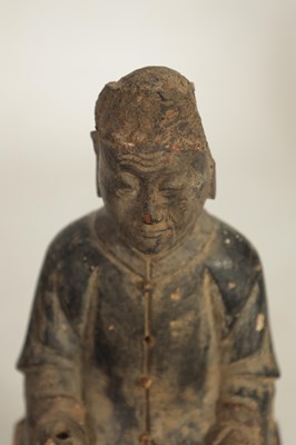 Lot 157 - A CHINESE MING PERIOD CARVED WOODEN FIGURE OF AN IMMORTAL
