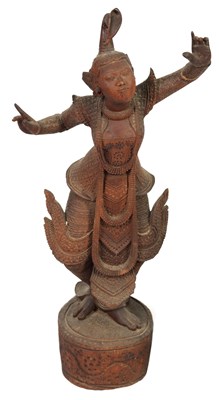 Lot 193 - AN EARLY 20TH CENTURY BURMESE CARVED HARDWOOD DANCING FIGURE