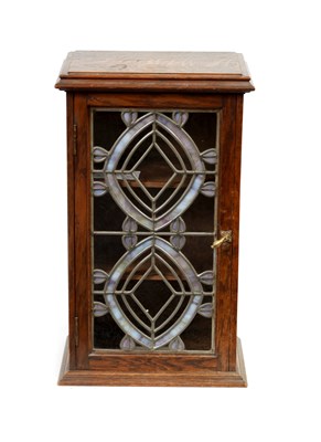 Lot 895 - AN ART NOUVEAU OAK AND STAINED GLASS HANGING CUPBOARD