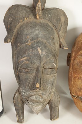 Lot 168 - A COLLECTION OF FOUR TRIBAL AFRICAN FACE MASKS