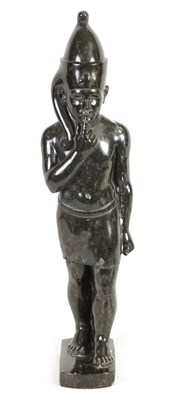 Lot 523 - AN UNUSUAL CARVED MARBLE EGYPTIAN STYLE FIGURE OF A STANDING MAN