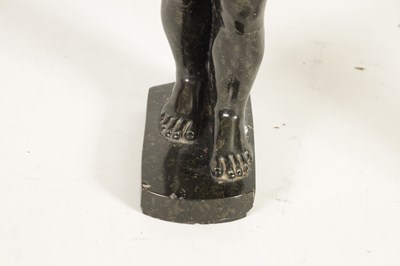 Lot 523 - AN UNUSUAL CARVED MARBLE EGYPTIAN STYLE FIGURE OF A STANDING MAN