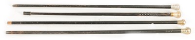 Lot 480 - A COLLECTION OF FOUR SILVER HANDLED EBONISED WALKING CANES