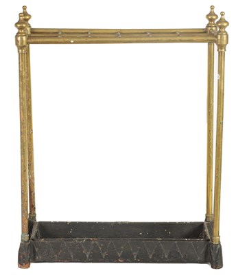 Lot 440 - A LATE 19TH CENTURY BRASS AND CAST IRON STICK STAND