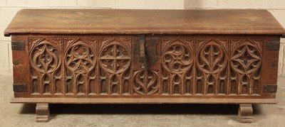 Lot 959 - A 17TH CENTURY CONTINENTAL GOTHIC CARVED ELM COFFER