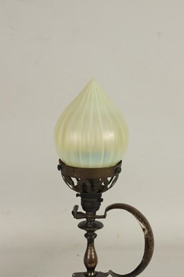 Lot 589 - A PATINATED BRASS ART AND CRAFTS TABLE LAMP WITH VASELINE GLASS SHADE