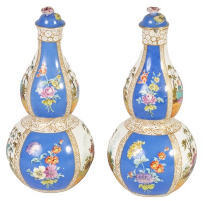Lot 48 - A PAIR OF LATE 19TH CENTURY DRESDEN TYPE AUGUSTUS REX TAPERING DOUBLE GOURD BOTTLE VASES AND COVERS