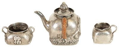 Lot 253 - AN EARLY 20TH CENTURY CHINESE SILVER THREE PIECE TEA SET