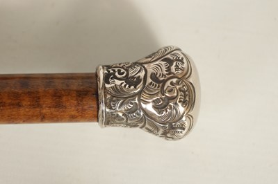 Lot 452 - A COLLECTION OF THREE SILVER TOPPED WALKING CANES