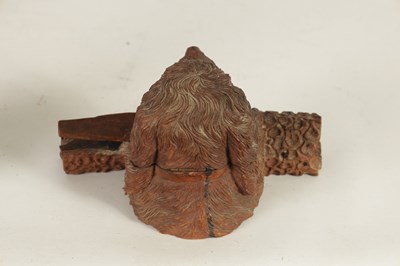 Lot 871 - A 19TH CENTURY BLACK FOREST CARVED LINDENWOOD INKWELL FORMED AS DOG RESTING ON A LOG