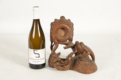 Lot 105 - A 19TH CENTURY EASTERN CARVED WOOD DESK STAND