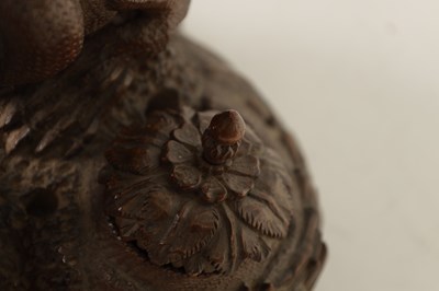 Lot 105 - A 19TH CENTURY EASTERN CARVED WOOD DESK STAND