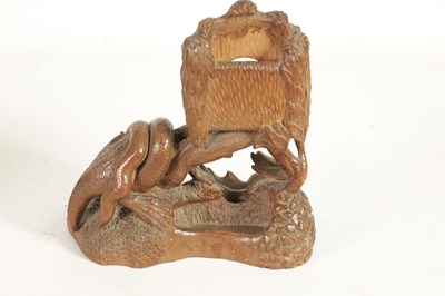 Lot 105 - A 19TH CENTURY EASTERN CARVED WOOD DESK STAND