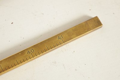 Lot 401 - AN EARLY 19TH CENTURY BRASS BARREL MEASURE BY 'DE GRAVE OF Co LONDON'